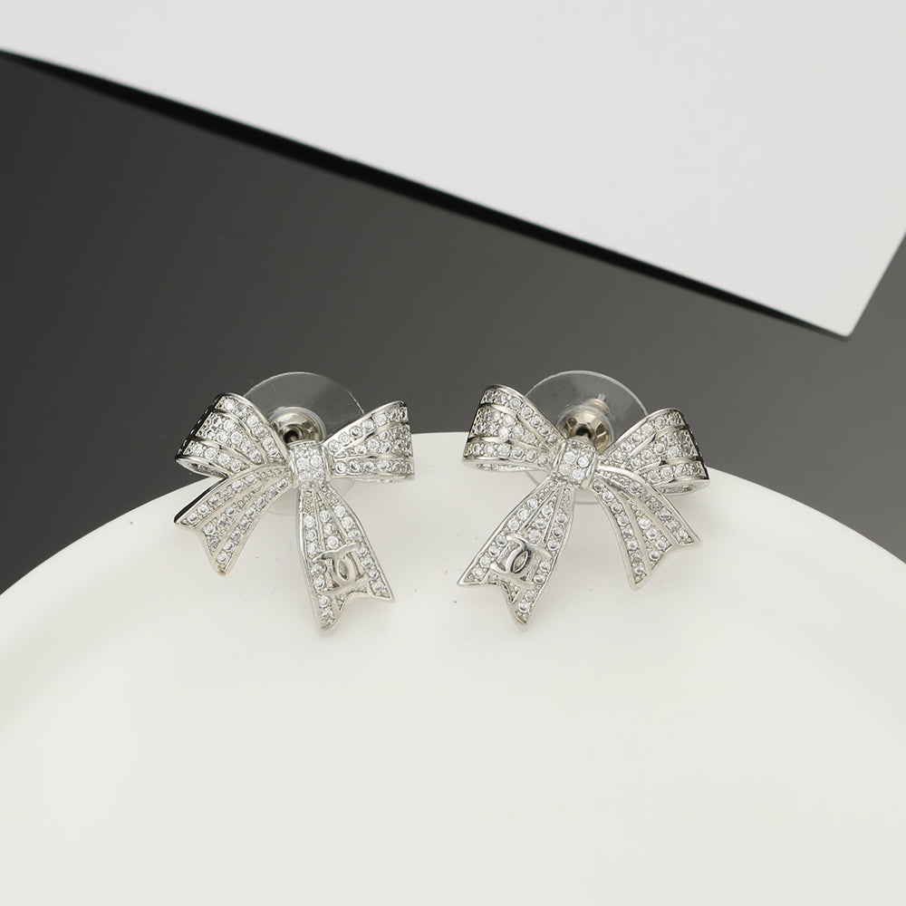 18K Chanel Bow Tie Diamond Earrings