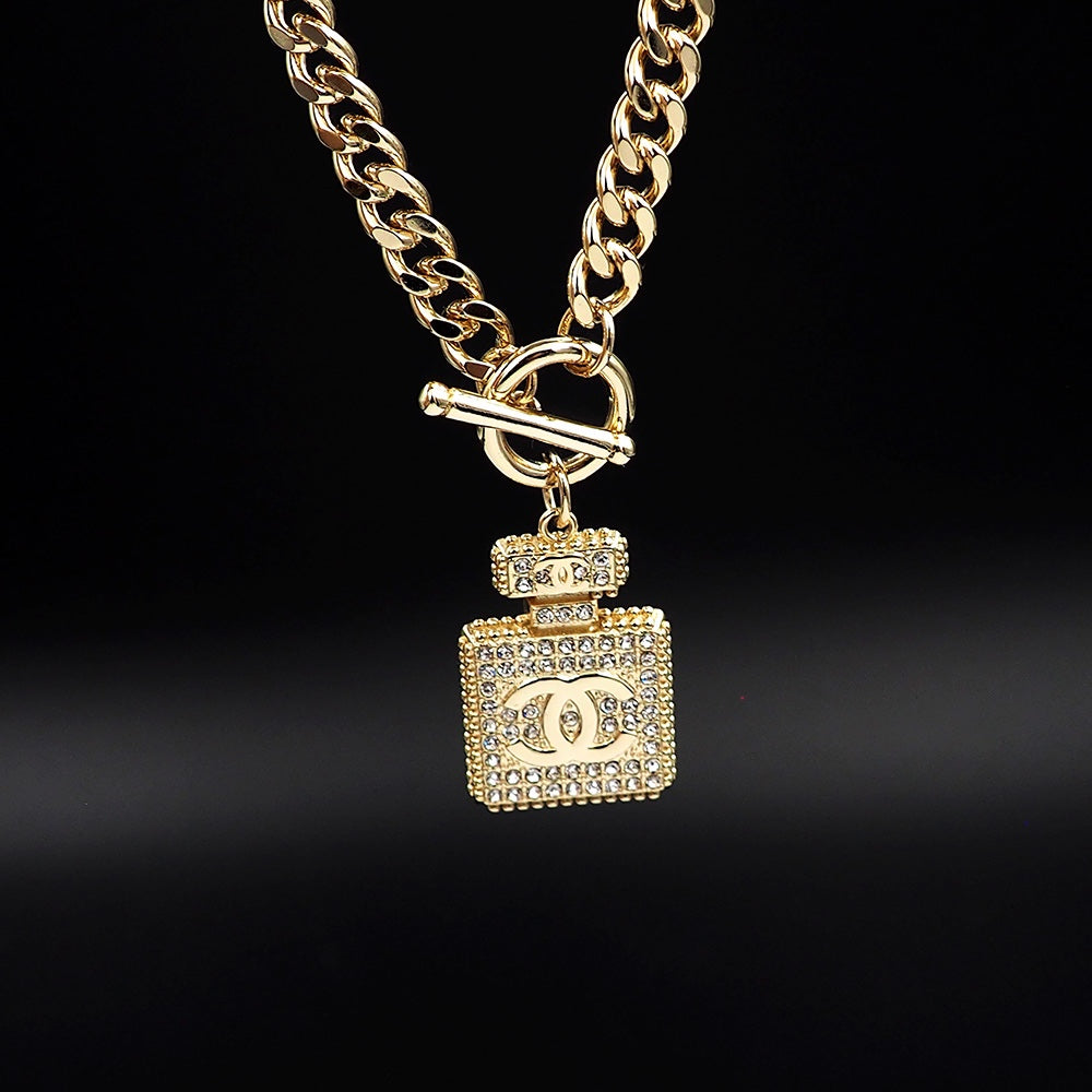 18K Chanel Diamond Perfume Bottle Pendant Necklace